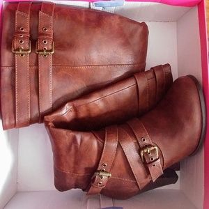 Knee high buckle boots